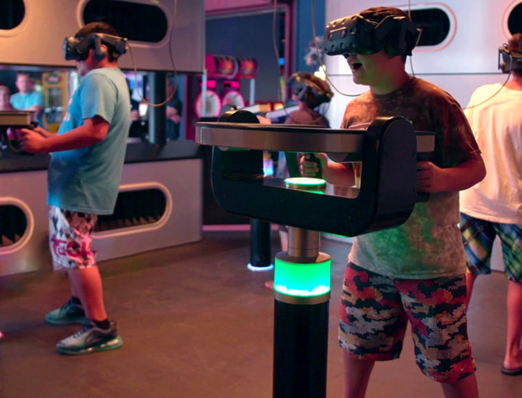People with VR sets in an attraction park