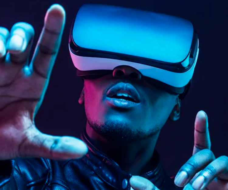 Man using a VR heaset for haptic technology